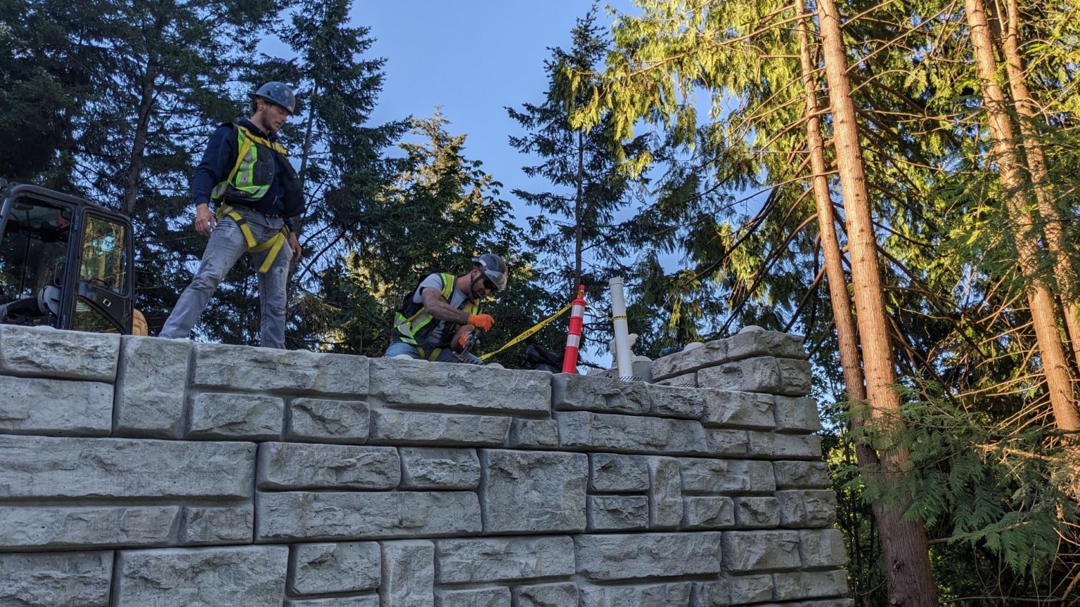 The Shakespeare Homes crew on the retaining wall at the end of the day